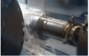 a cylinder is processing with the diamond grinding service